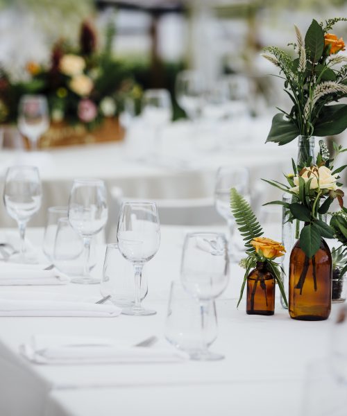 Luxury table settings for fine dining with and glassware, beautiful blurred  background. For events, weddings.